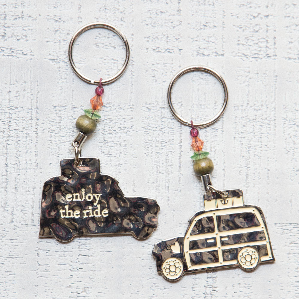 woody/ enjoy the ride token keychain